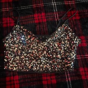 Black crop with with sequins. Size small.